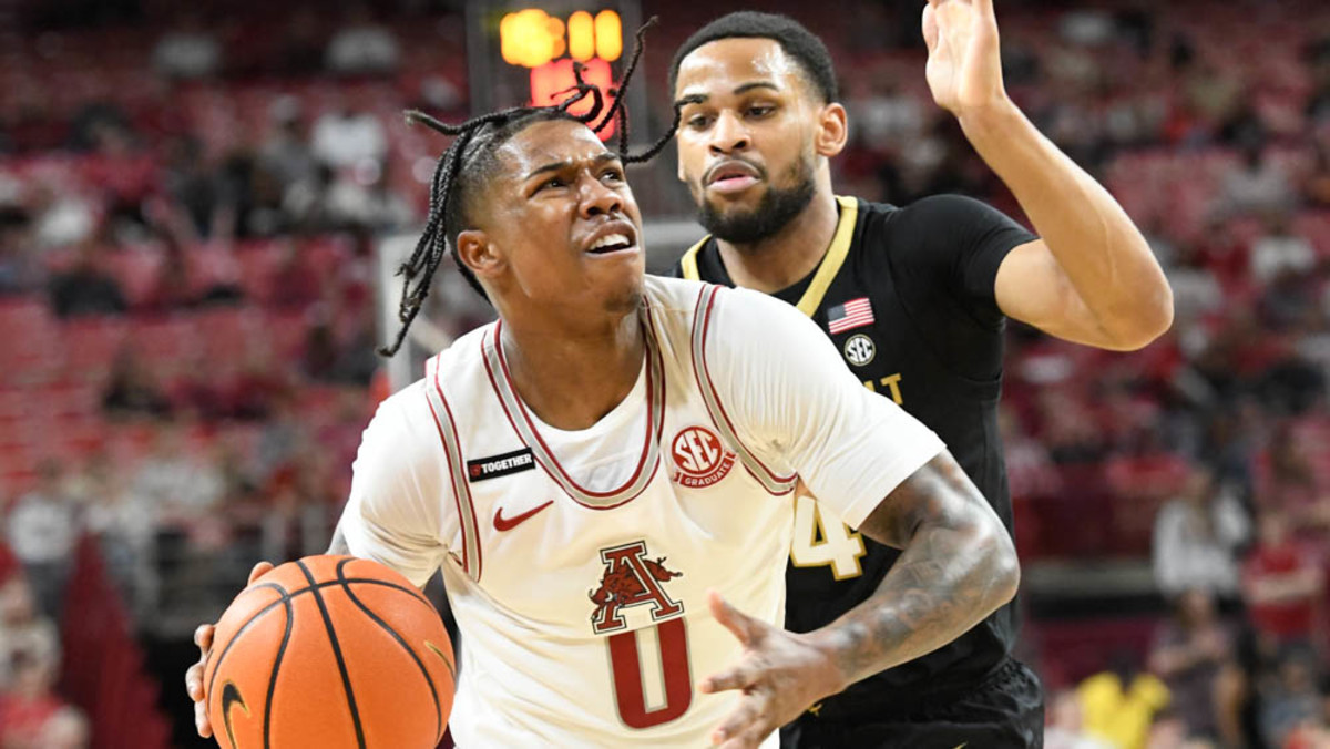 Razorbacks' Khalif Battle driving against Vanderbilt